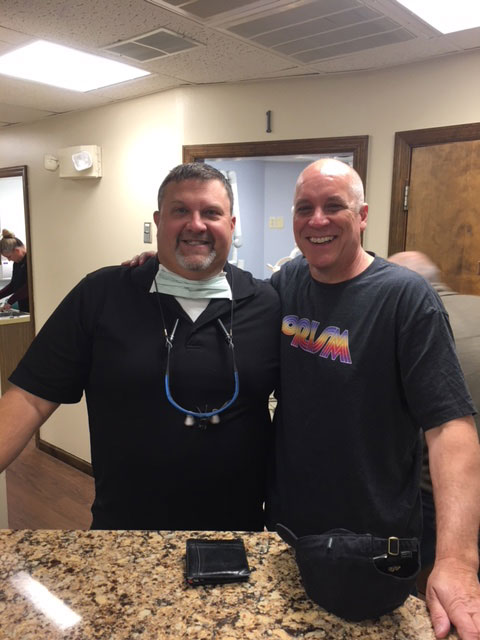 Dr. Baccellieri Jr. with a patient at Baccellieri Family Dentistry